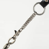 close up of attachment of silver flogger on white background. 