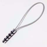 Metal Rug Beater with a braided rope on a white background