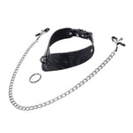 Product shot of the Velvet Noir collar 
 disassembled against a white background. In front of the collar is a metal ring and a set of nipple clamps on a long chain. 