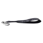 The Velvet Noir Loop Paddle seen from the side on a white background.