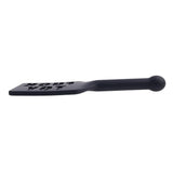The Edge "Fuck Toy" Silicone Paddle seen from the side, in profile. 