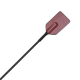 Closeup of the "crop" end of the Saffron Tap and Tickle. It's the "keeper"  made of burgundy leather for sharp spanking. 