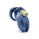 A chastity cage made of blue plastic with glitter embedded in the surface.  A brass padlock on the top keeps it closed.