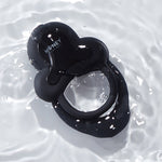 Black model of the Anello double c-ring floating in water. 