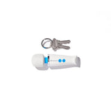 The Magic Wand Micro lying horizontally next to a set of keys for size comparison. The keys are about one-third the length of the vibrator. 