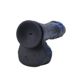 Black and blue rubber duck on a white background