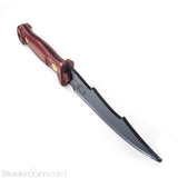 The top of the stockroom x Chaotic Kink electro-knife is shown on a white background. The Stockroom cuff logo is etched on the base of the blade.