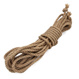 The natural oiled jute rope is shown tied in a bundle on a white background.