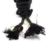 the knotted ends of the black bamboo silk conductive rope are shown on a white background.