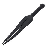 Silicone tawse on a white background