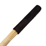 The handle of the 23-inch wide rug beater is shown on a white background. 