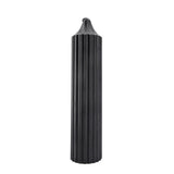 The black scented was play drip candle is shown against a white background. 