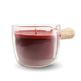 The easy pour wax play candle with wooden handle is shown on a white background.