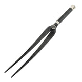 Black fork shaped whipped  with decorative handle on a white background