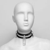 Front view of mannequin head wearing a collar made of two bands of rubber with nickel-coated hardware. 
