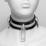 Close-up of mannequin, focused on the rectangular attachment point in the front of the collar. 
