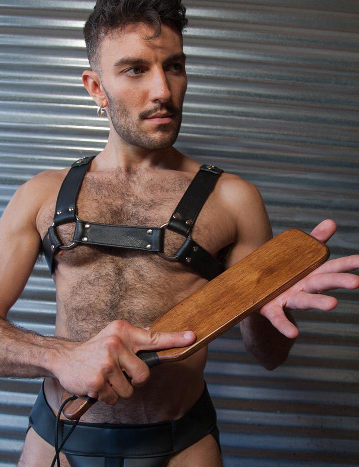Using the Paddle – Male on male spanking stories